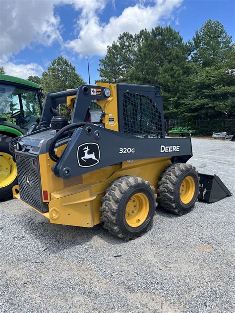 used john deere 320g skid steer